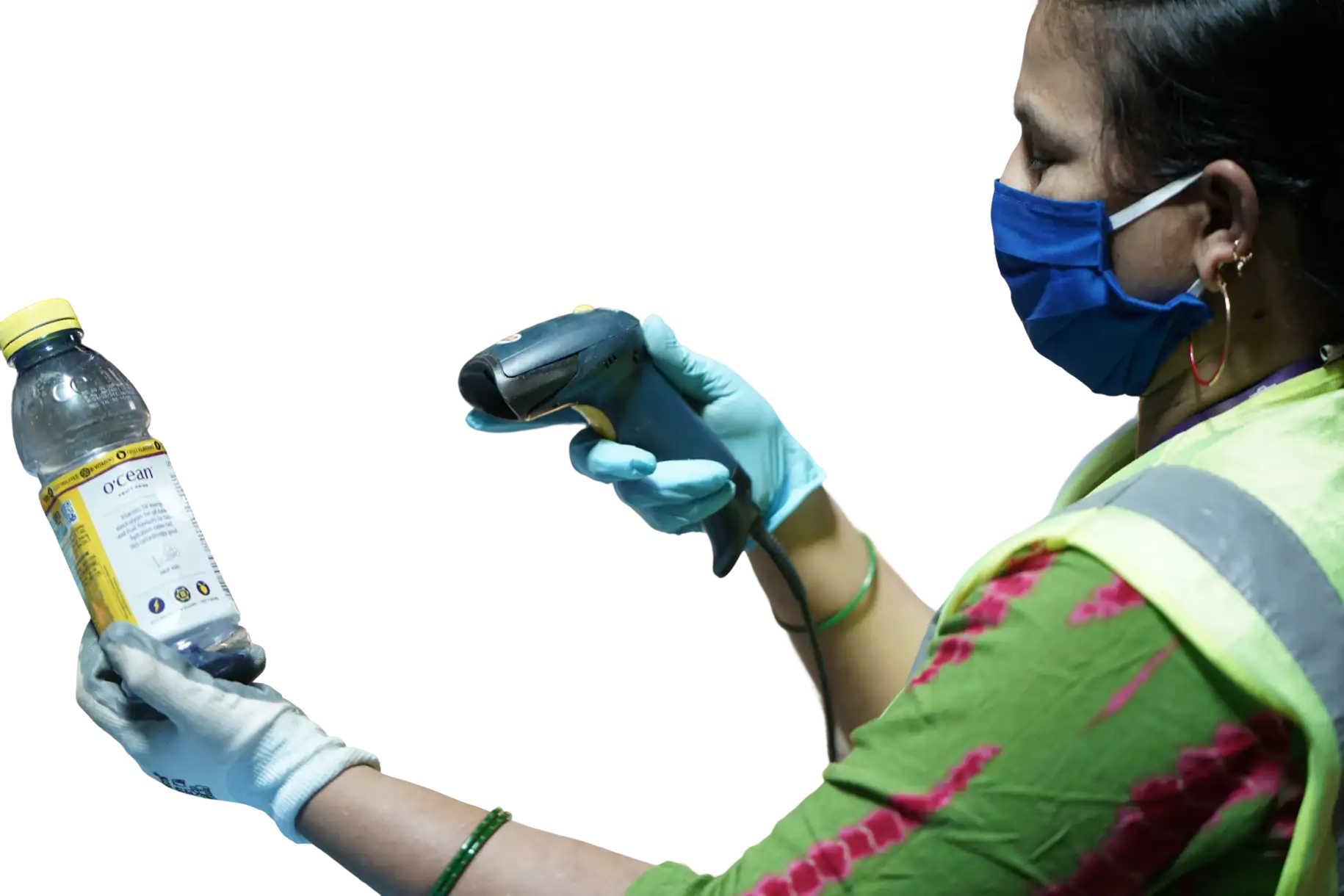 A gloved hand scanning a discarded pack with a barcode gun